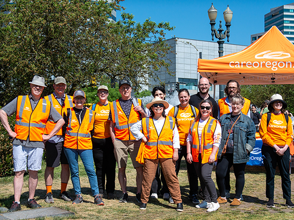 CareOregon Staff wearing orange vests ready to volunteer