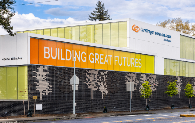 Exterior of the CareOregon Boys & Girls Club at Rockwood, featuring the text ‘BUILDING GREAT FUTURES’ on the side.